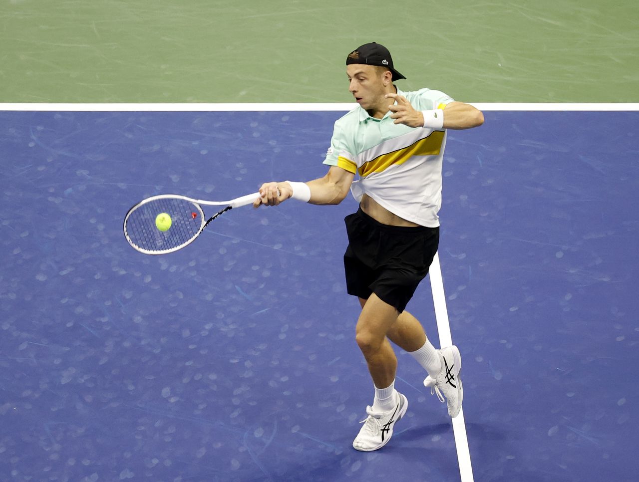 Sep 2, 2021; Flushing, NY, USA; Tallon Griekspoor of Netherlands hits a shot against Novak Djokovic of Serbia in a second round match on day four of the 2021 U.S. Open tennis tournament at USTA Billie Jean King National Tennis Center. Mandatory Credit: Jerry Lai-USA TODAY Sports