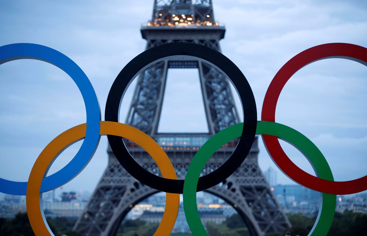 FILE PHOTO: Olympic rings to celebrate the IOC official announcement that Paris won the 2024 Olympic bid are seen in front of the Eiffel Tower at the Trocadero square in Paris, France, September 14, 2017. REUTERS/Christian Hartmann/File Photo