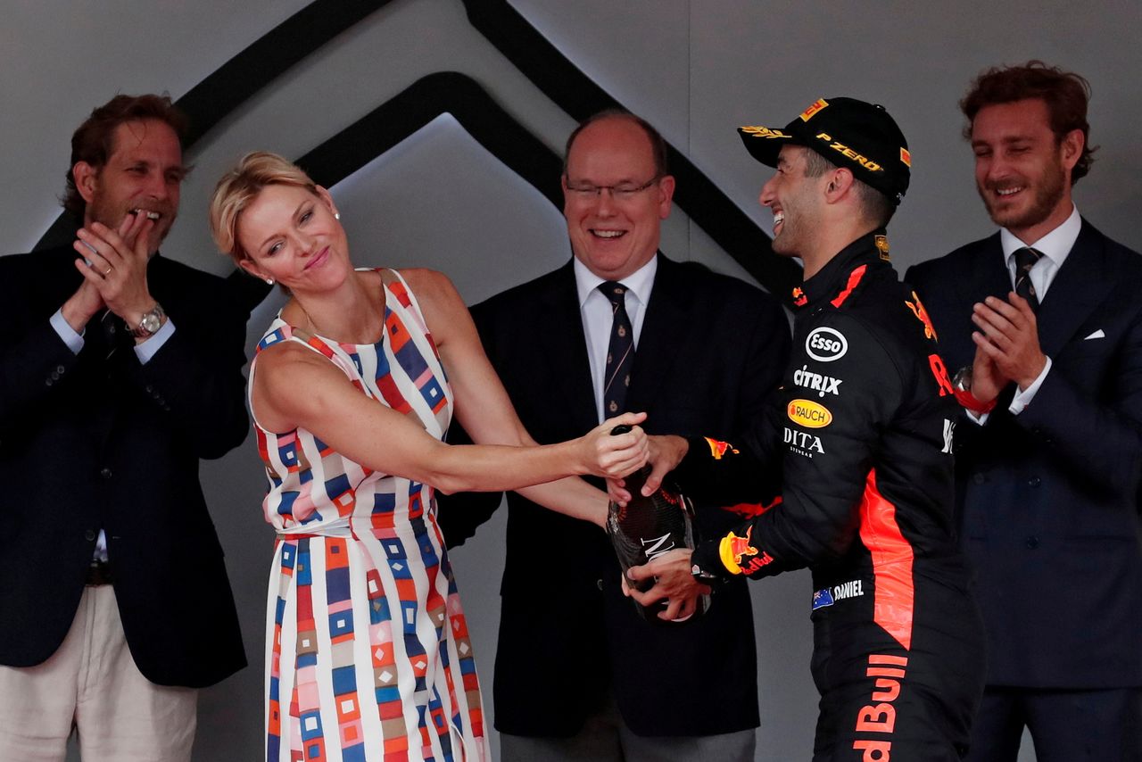FILE PHOTO: Formula One F1 - Monaco Grand Prix - Circuit de Monaco, Monte Carlo, Monaco - May 27, 2018 Princess Charlene of Monaco holds a bottle of champagne on the podium after Red Bull