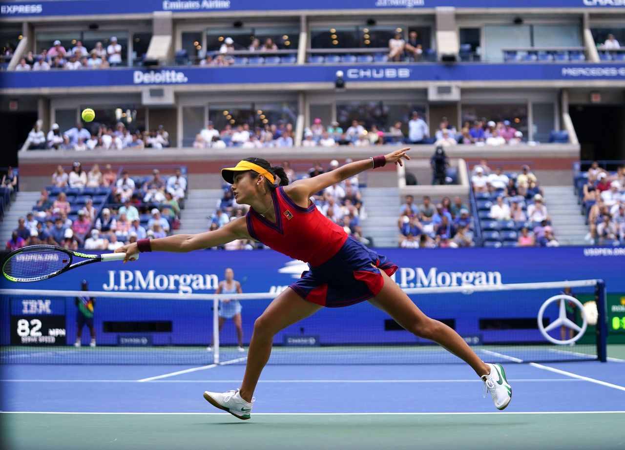 Sep 6, 2021; Flushing, NY, USA; Emma Raducanu of Great Britain hits to Shelby Rogers of the United States on day eight of the 2021 U.S. Open tennis tournament at USTA Billie Jean King National Tennis Center. Danielle Parhizkaran-USA TODAY Sports