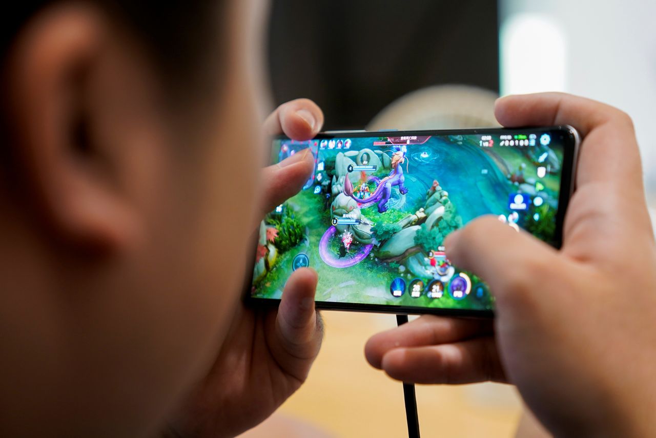 A player of Rogue Warriors esports team trains for the game "Arena of Valor" at his club in Shanghai, China September 3, 2021. Picture taken September 3, 2021. REUTERS/Aly Song