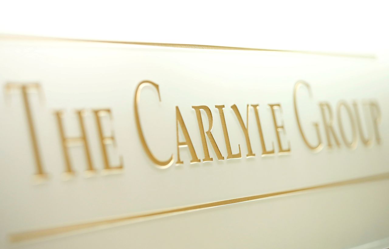 FILE PHOTO: The logo of the Carlyle Group is displayed at the company