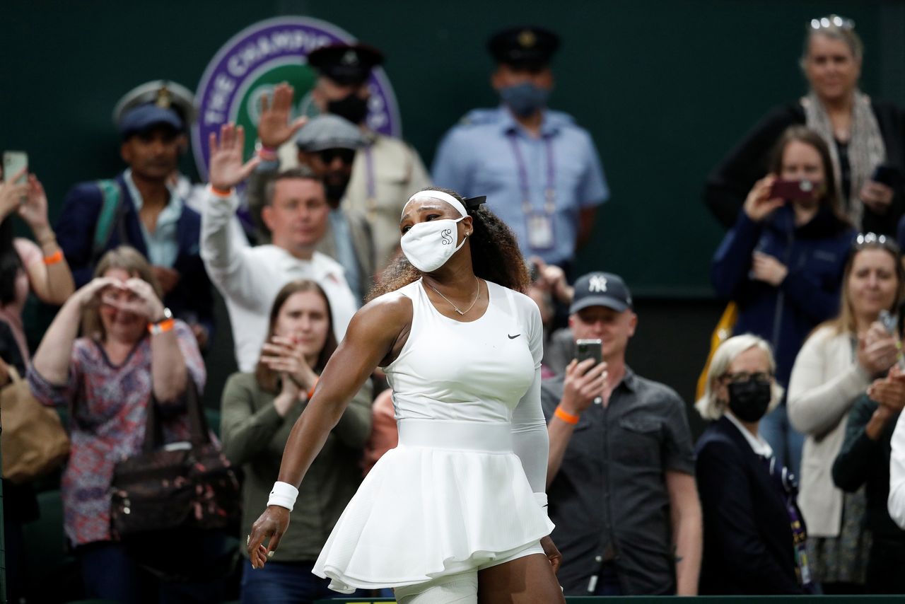 FILE PHOTO: Tennis - Wimbledon - All England Lawn Tennis and Croquet Club, London, Britain - June 29, 2021 Serena Williams of the U.S. leaves court as she retires from her first round match against Belarus