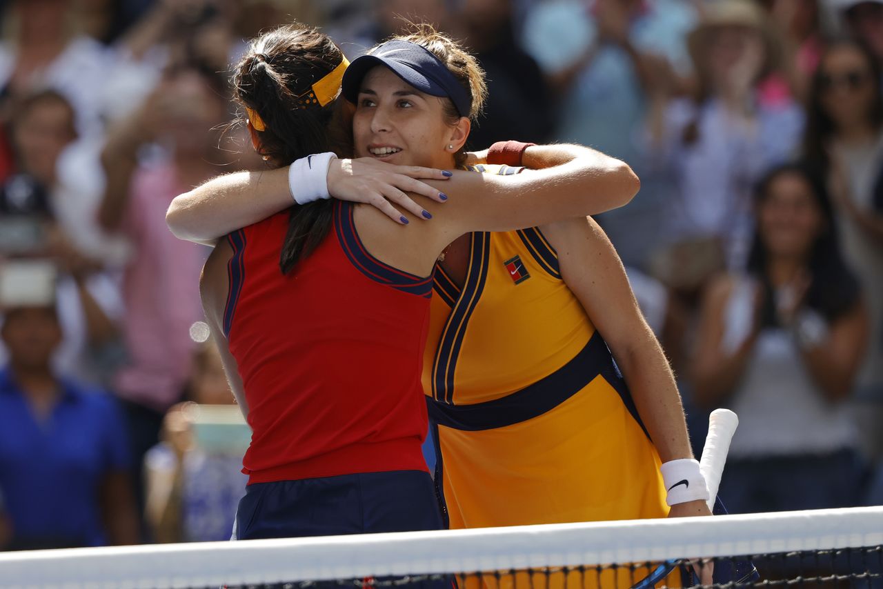 Sep 8, 2021; Flushing, NY, USA; Emma Raducanu of Great Britain (L) hugs Belinda Bencic of Switzerland (R) after their match on day ten of the 2021 U.S. Open tennis tournament at USTA Billie Jean King National Tennis Center. Mandatory Credit: Geoff Burke-USA TODAY Sports