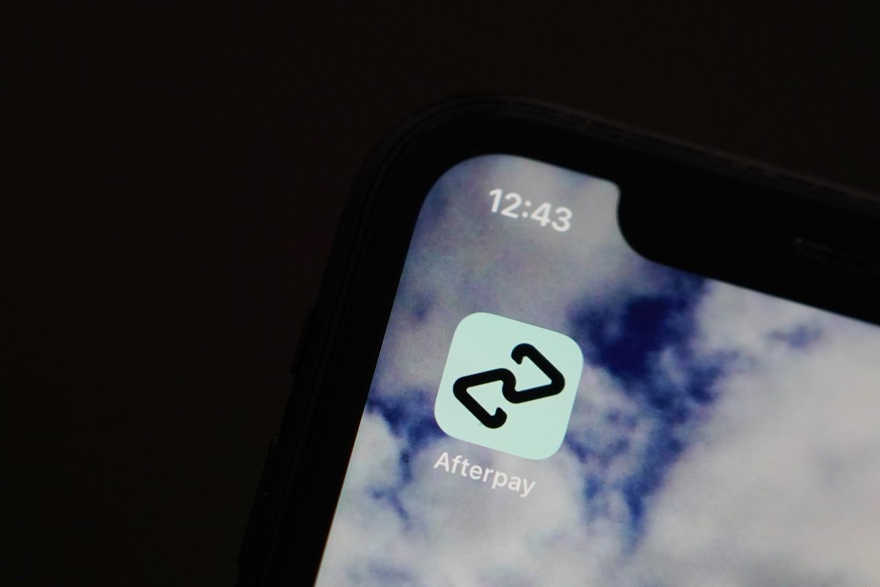 FILE PHOTO: The Afterpay app is seen on the screen of a mobile phone in a picture illustration taken August 2, 2021. REUTERS/Loren Elliott/Illustration