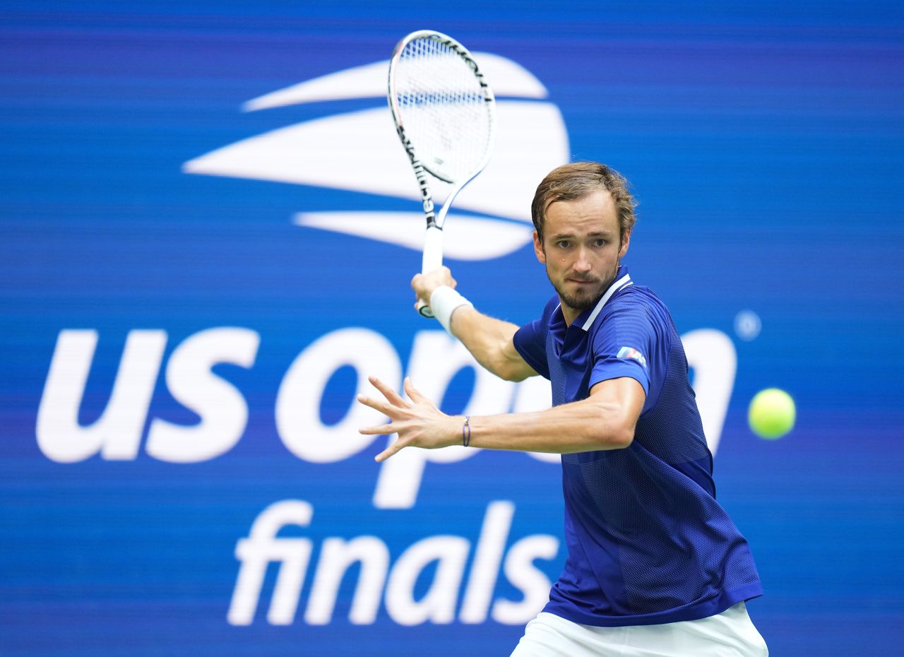 Sep 12, 2021; Flushing, NY, USA; Daniil Medvedev of Russia hits a shot against Novak Djokovic of Serbia in the men