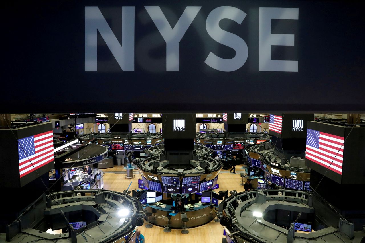 FILE PHOTO: The floor of the the New York Stock Exchange (NYSE) is seen after the close of trading in New York, U.S., March 18, 2020. REUTERS/Lucas Jackson