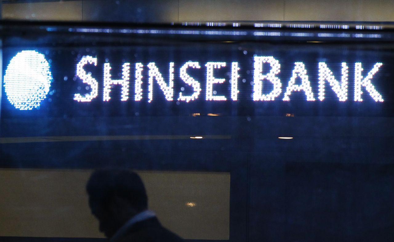 FILE PHOTO: The Shinsei Bank logo is pictured at the lobby of the bank in Tokyo October 22, 2010. REUTERS/Yuriko Nakao
