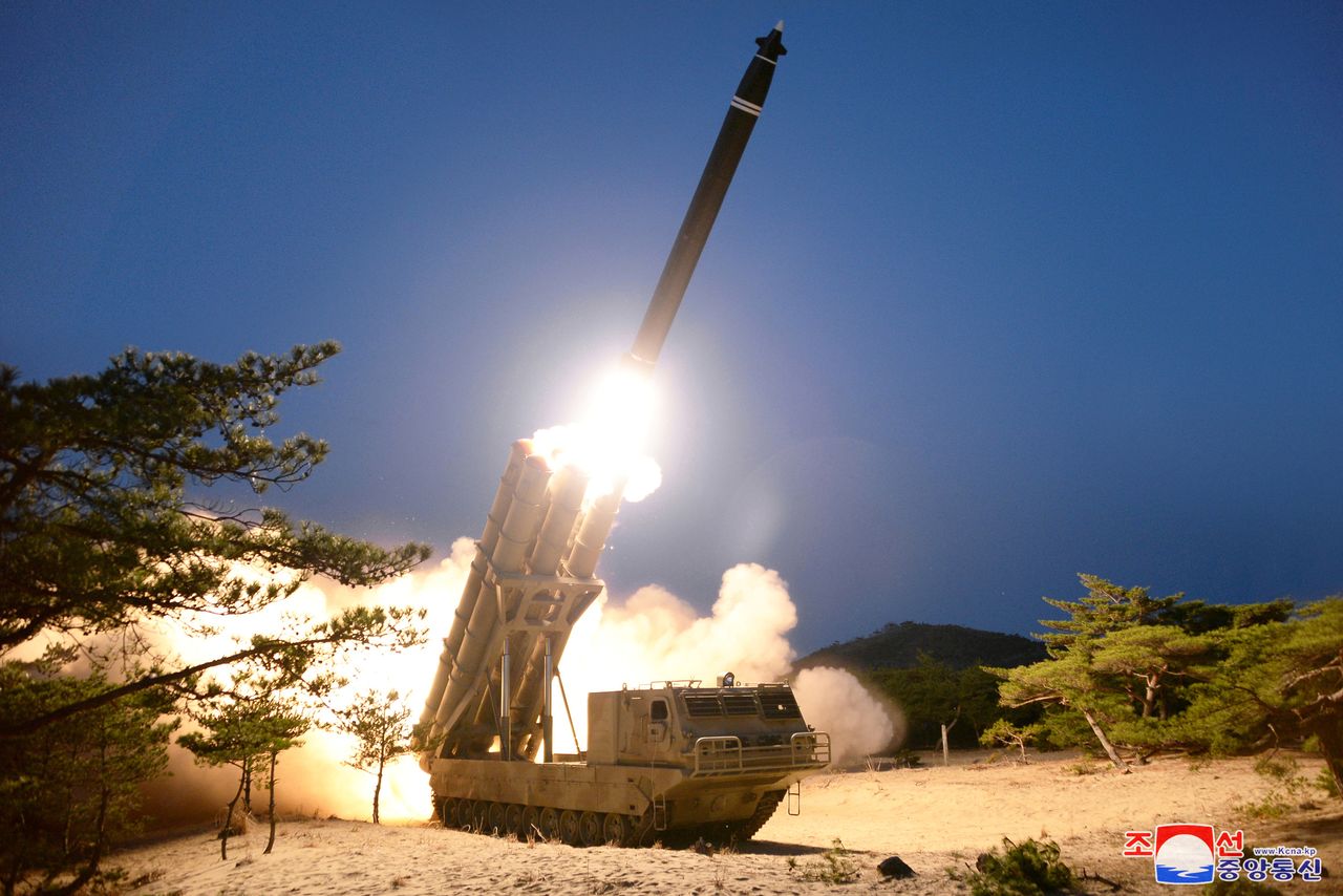 A view shows the testing of what local media call a super-large multiple rocket launcher in North Korea, in this undated photo released on March 28, 2020 by North Korea