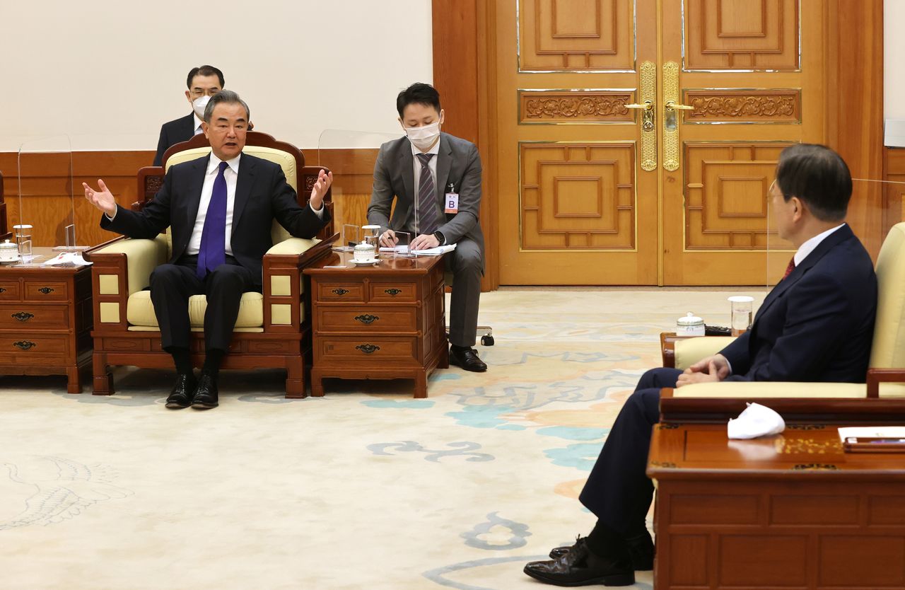 Chinese Foreign Minister Wang Yi speaks during a meeting with South Korean President Moon Jae-in at the Presidential Blue House in Seoul, South Korea, September 15, 2021.   Yonhap via REUTERS   ATTENTION EDITORS - THIS IMAGE HAS BEEN SUPPLIED BY A THIRD PARTY. SOUTH KOREA OUT. NO RESALES. NO ARCHIVE.
