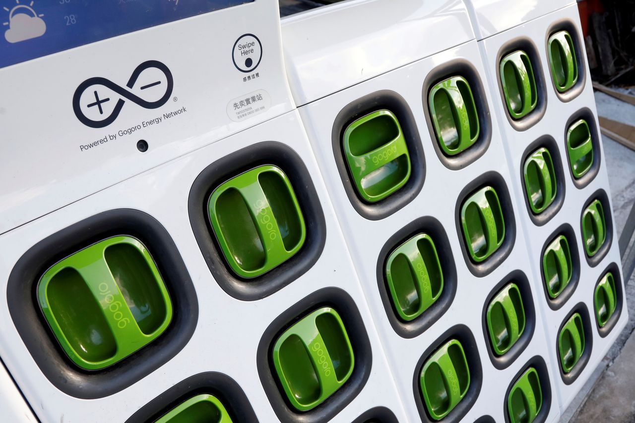 FILE PHOTO: Batteries for Gogoro, an electric scooter brand, are seen inside a charging station in Taipei, Taiwan August 10, 2017. REUTERS/Tyrone Siu/File Photo