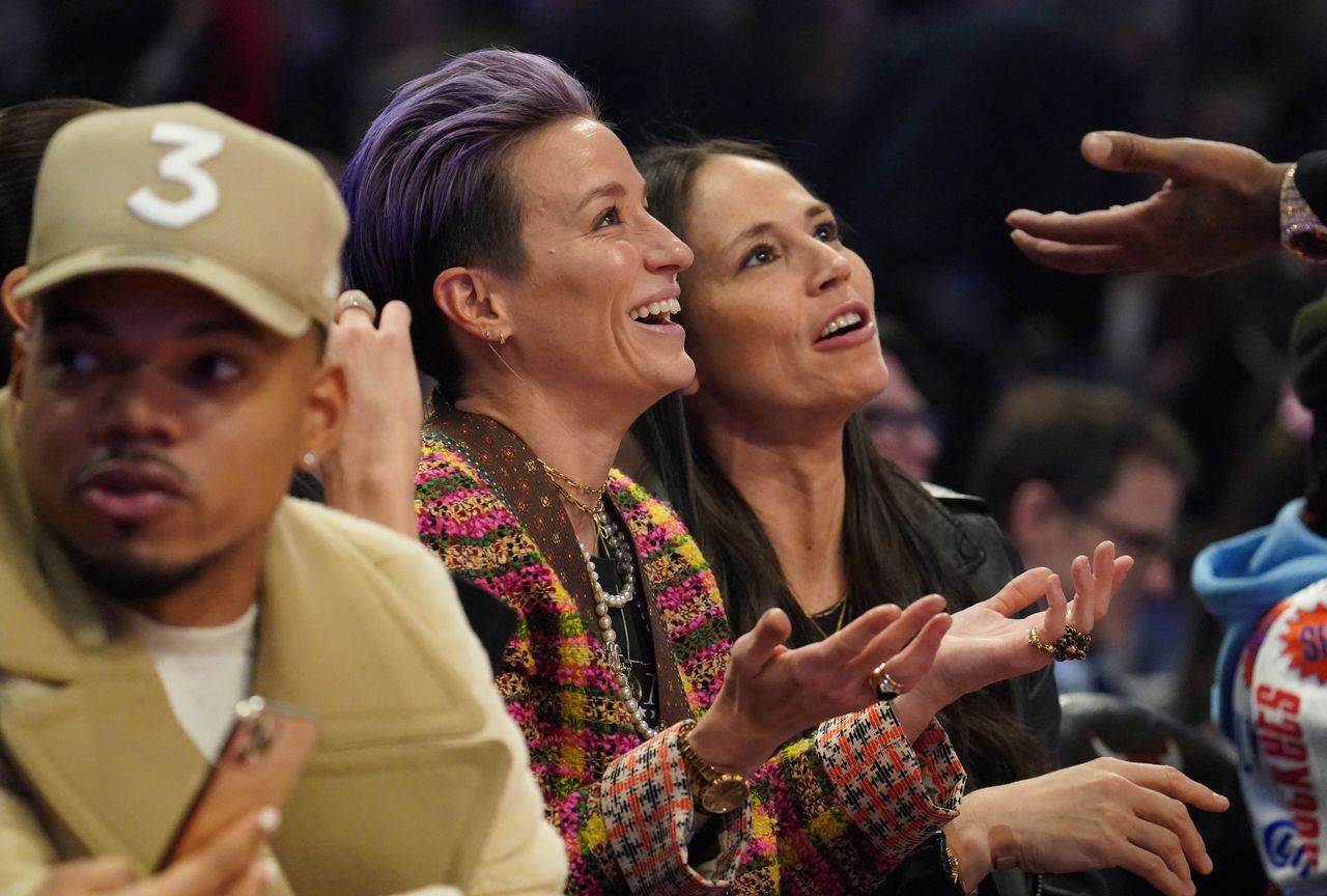 FILE PHOTO: Feb 16, 2020; Chicago, Illinois, USA; From left Recording artist Chance The Rapper , Megan Rapinoe and Sue Bird in attendance in the first quarter during the 2020 NBA All Star Game at United Center. Mandatory Credit: Kyle Terada-USA TODAY Sports/File Photo