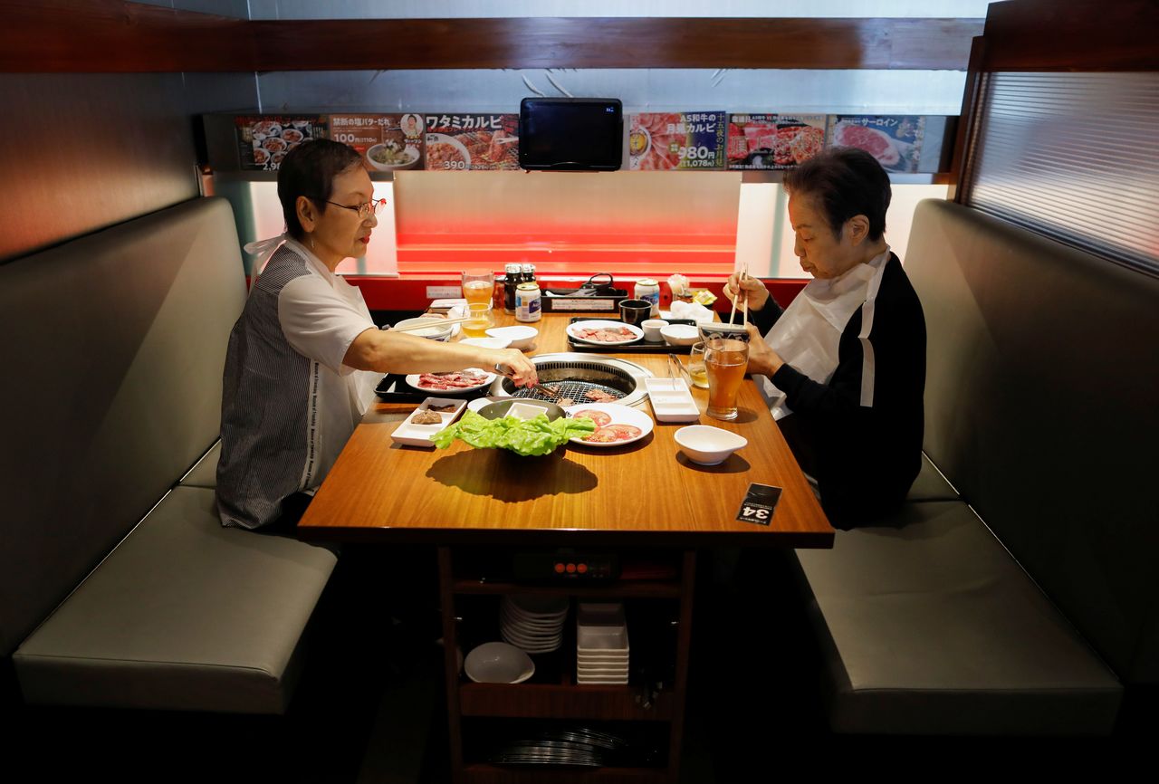 Customers have lunch at the yakiniku barbecue restaurant named