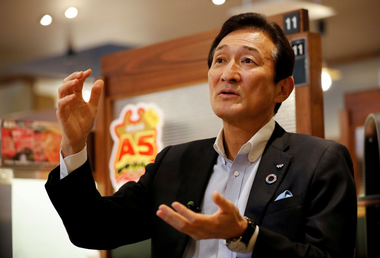 Miki Watanabe, Chairman and CEO of Watami Co. speaks during an interview with Reuters at the company
