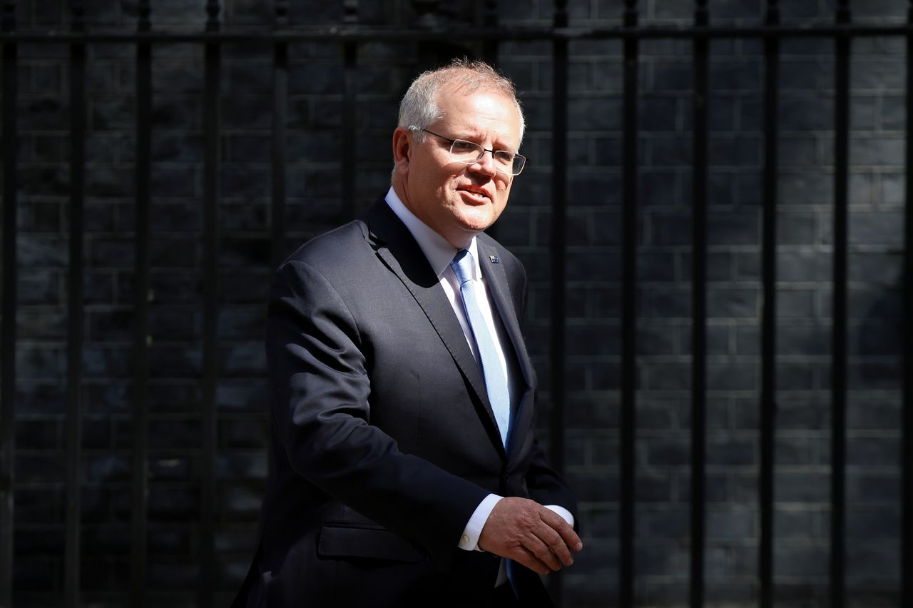 FILE PHOTO: Australian Prime Minister Scott Morrison leaves Downing Street in London, Britain, June 15, 2021. REUTERS/Henry Nicholls