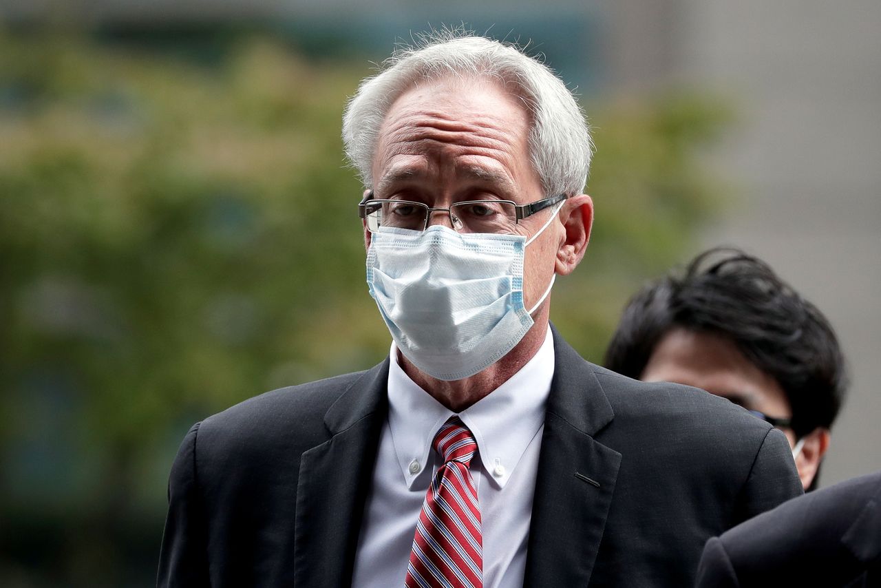 Greg Kelly, former representative director of Nissan Motor Co., arrives for the first trial hearing at the Tokyo District Court in Tokyo, Japan, September 15, 2020.   Kiyoshi Ota/Pool via REUTERS/Files