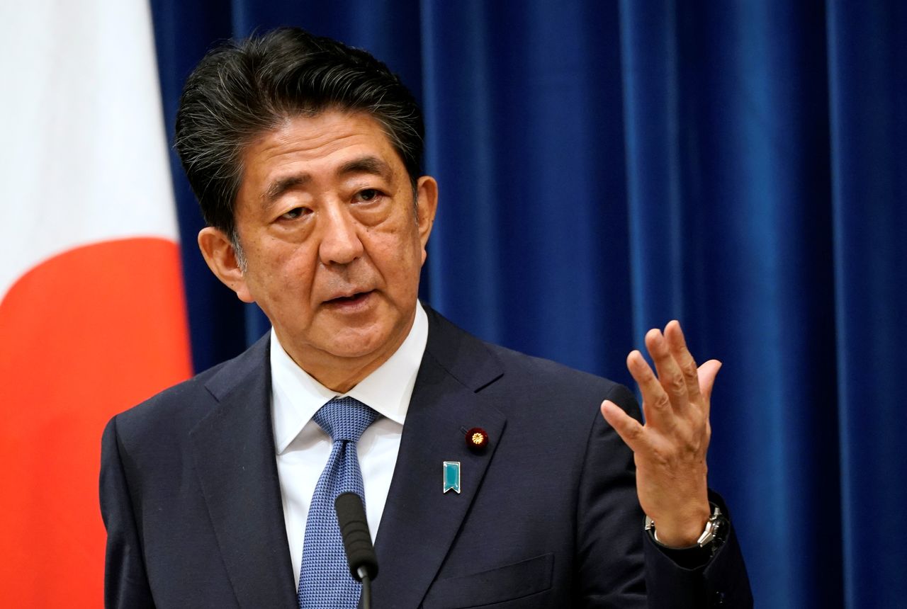 FILE PHOTO: Japanese Prime Minister Shinzo Abe speaks during a news conference at the prime minister