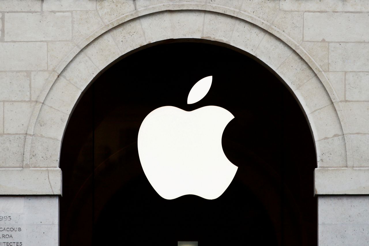 FILE PHOTO: Apple logo is seen on the Apple store at The Marche Saint Germain in Paris, France July 15, 2020. REUTERS/Gonzalo Fuentes/File Photo