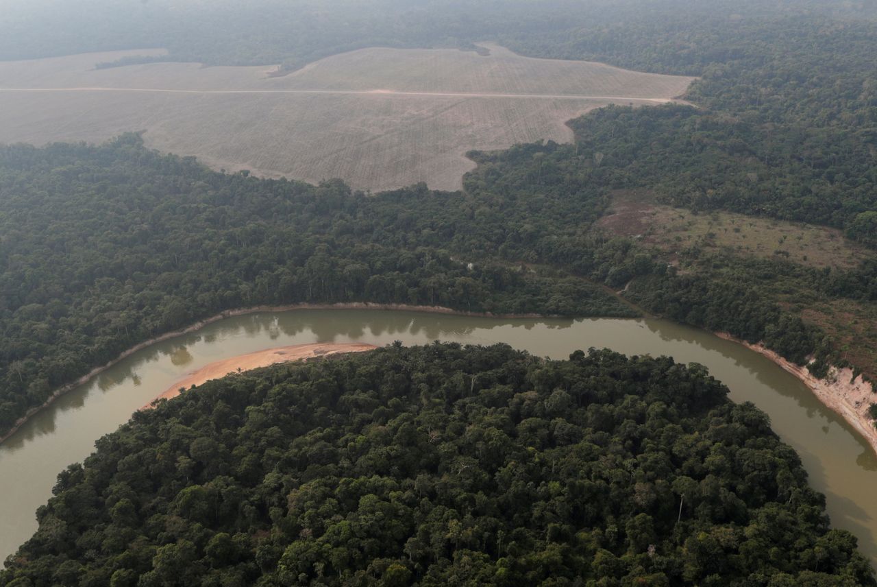 FILE PHOTO: aerial view shows a river and a deforested plot of the Amazon near Porto Velho, Rondonia State, Brazil August 14, 2020. REUTERS/Ueslei Marcelino