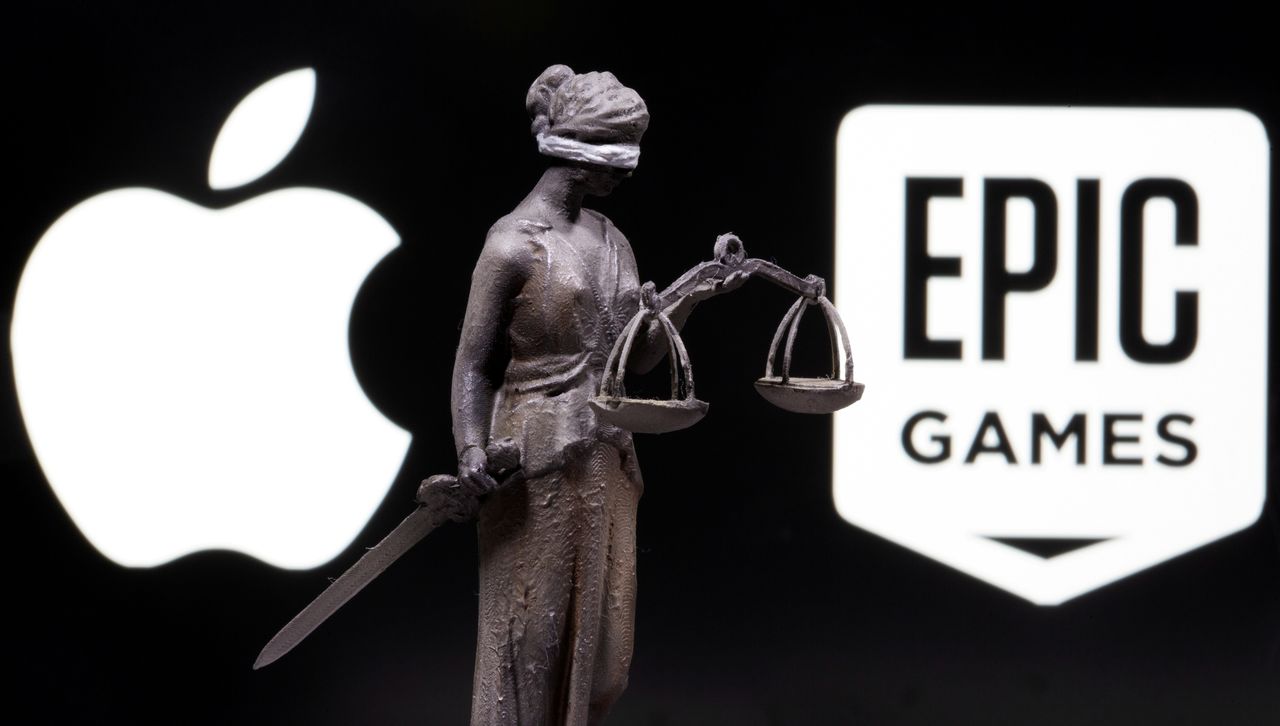 FILE PHOTO: 3D printed Lady Justice figure is seen in front of displayed Apple and Epic Games logos in this illustration photo taken February 17, 2021. REUTERS/Dado Ruvic/Illustration/File Photo