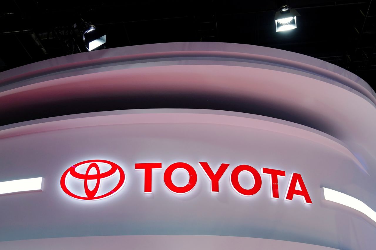 FILE PHOTO: The Toyota logo is seen at its booth during a media day for the Auto Shanghai show in Shanghai, China April 19, 2021. REUTERS/Aly Song