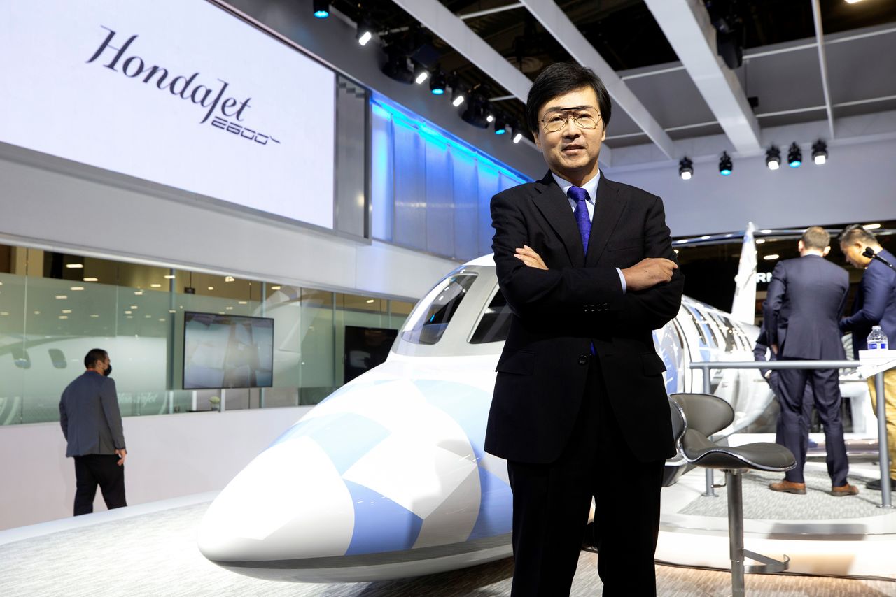 Michimasa Fujino, president and CEO of Honda Aircraft Company, poses by the HondaJet 2600 concept plane at the Las Vegas Convention Center during the NBAA Business Aviation Convention & Exhibition in Las Vegas, Nevada, U.S., October 12, 2021. REUTERS/Steve Marcus