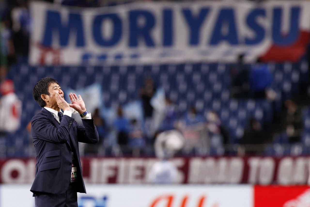FILE PHOTO: Soccer Football - World Cup - Asia Qualifiers - Group B - Japan v Australia - Saitama Stadium, Saitama, Japan - October 12, 2021 Japan coach Hajime Moriyasu celebrates after the match REUTERS/Kim Kyung-Hoon