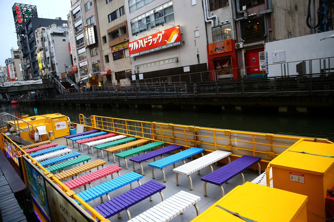 FILE PHOTO: A ship is pictured on an almost empty port in the Dotonbori amusement district of Osaka, Japan, March 14, 2020. REUTERS/Edgard Garrido