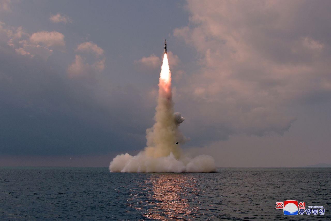 A new submarine-launched ballistic missile is seen during a test in this undated photo released on October 19, 2021 by North Korea