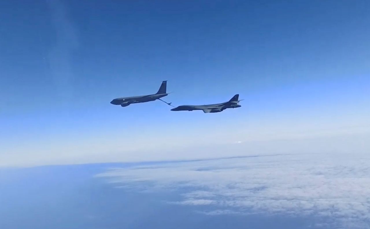 A view from a Russian Sukhoi Su-30 fighter jet shows, what the Russian Defence Ministry identified as a U.S. B-1B strategic bomber and KC-135 military refueling aircraft flying over the Black Sea, in this still image taken from video released on October 20, 2021. Russian Defence Ministry/Handout via REUTERS