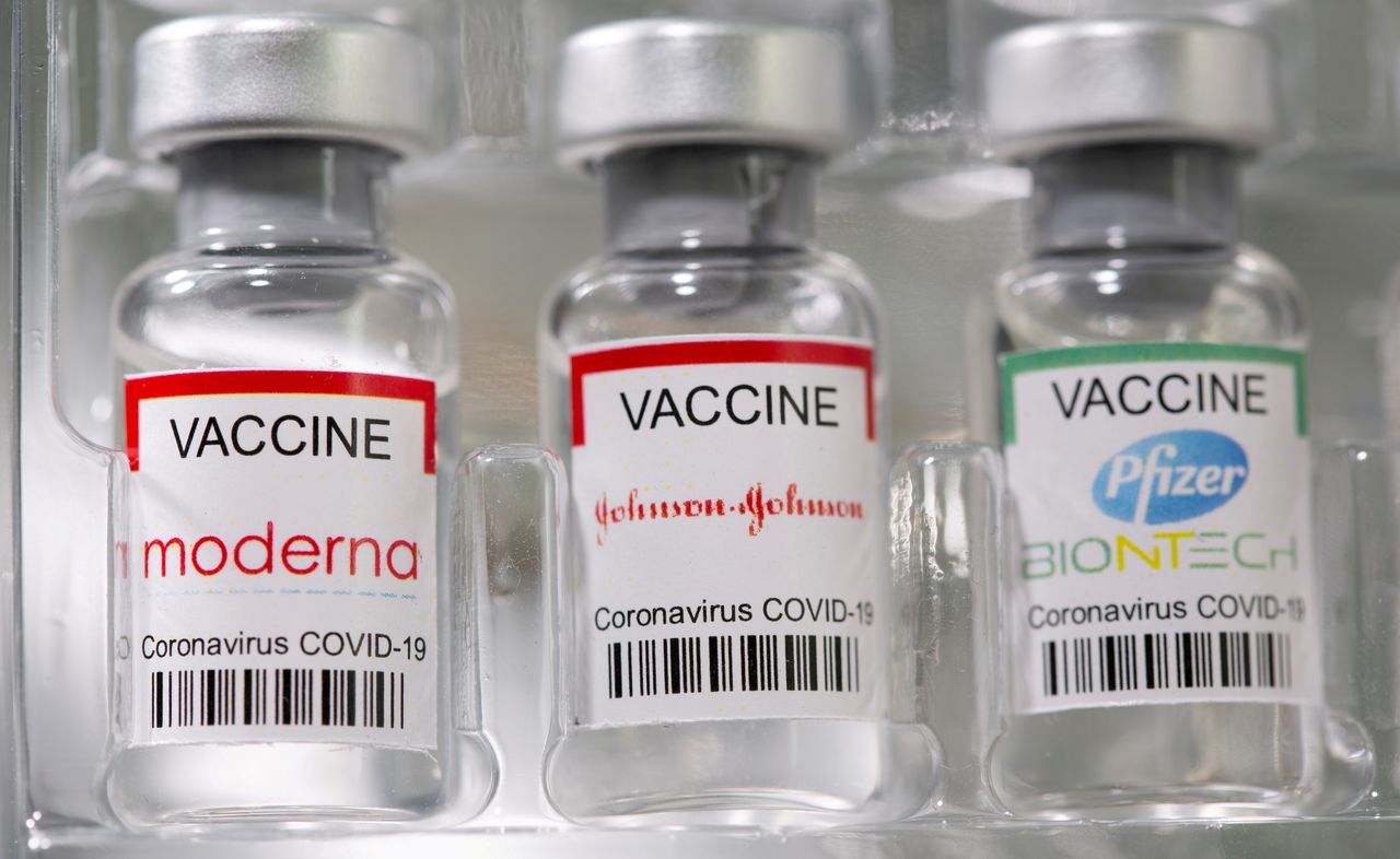 FILE PHOTO: Vials labelled "Moderna, Johnson & Johnson, Pfizer-BioNTech coronavirus disease (COVID-19) vaccine" are seen in this illustration picture taken May 2, 2021. REUTERS/Dado Ruvic