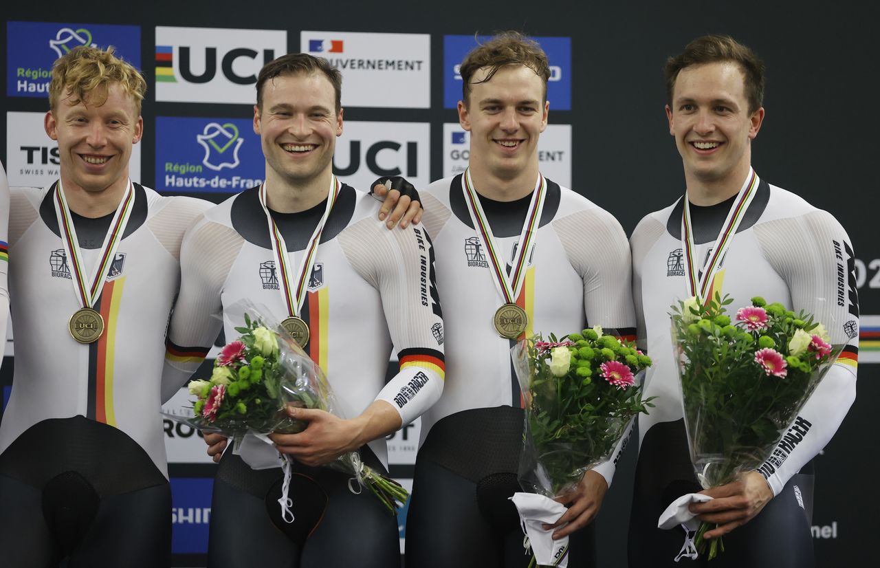 Cycling - UCI Track Cycling World Championships - Stab Velodrome, Roubaix, France - October 20, 2021 Bronze medalists, Germany’s Stefan Boetticher, Joachim Eilers and Nik Schroeter celebrate on the podium after the Men’s Team Sprint Bronze Medal Race REUTERS/Christian Hartmann