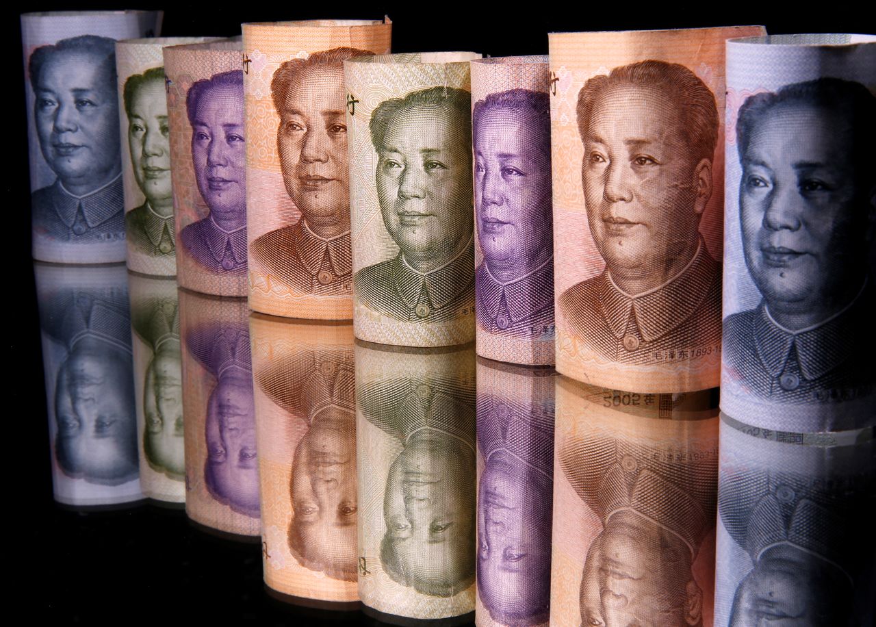 Chinese Yuan banknotes are seen in this illustration taken February 10, 2020. REUTERS/Dado Ruvic/Illustration