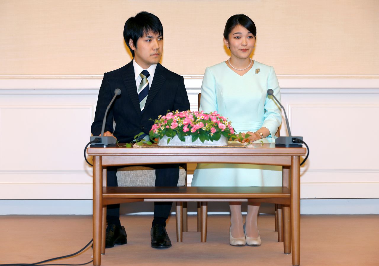 Princess Mako, the elder daughter of Prince Akishino and Princess Kiko, speaks to media with her fiancee Kei Komuro, a university friend of Princess Mako, during a press conference to announce their engagement at Akasaka East Residence in Tokyo, Japan, September 3, 2017. REUTERS/Shizuo Kambayashi/Pool