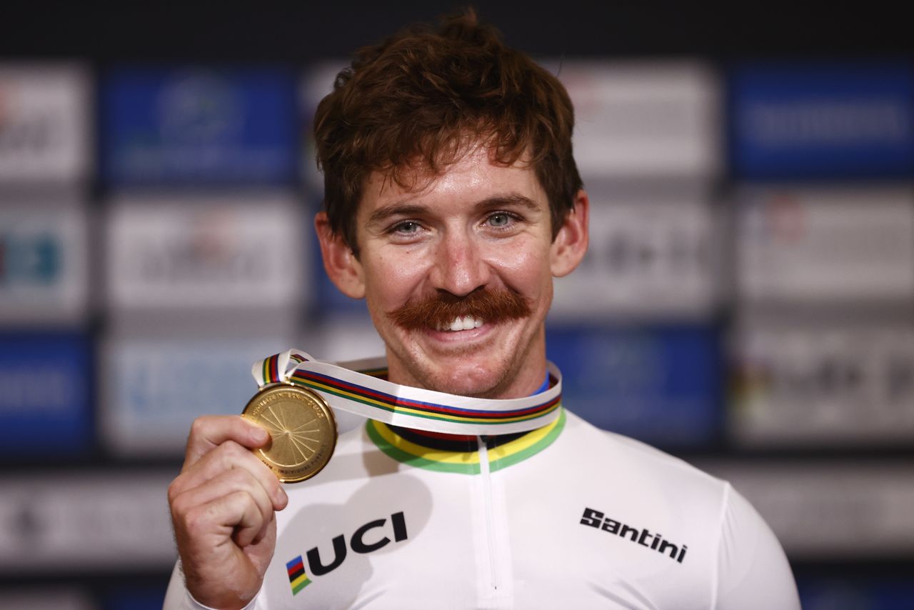 Cycling - UCI Track Cycling World Championships - Stab Velodrome, Roubaix, France - October 22, 2021 Ashton Lambie of the U.S. celebrates with the gold medal on the podium after winning the men
