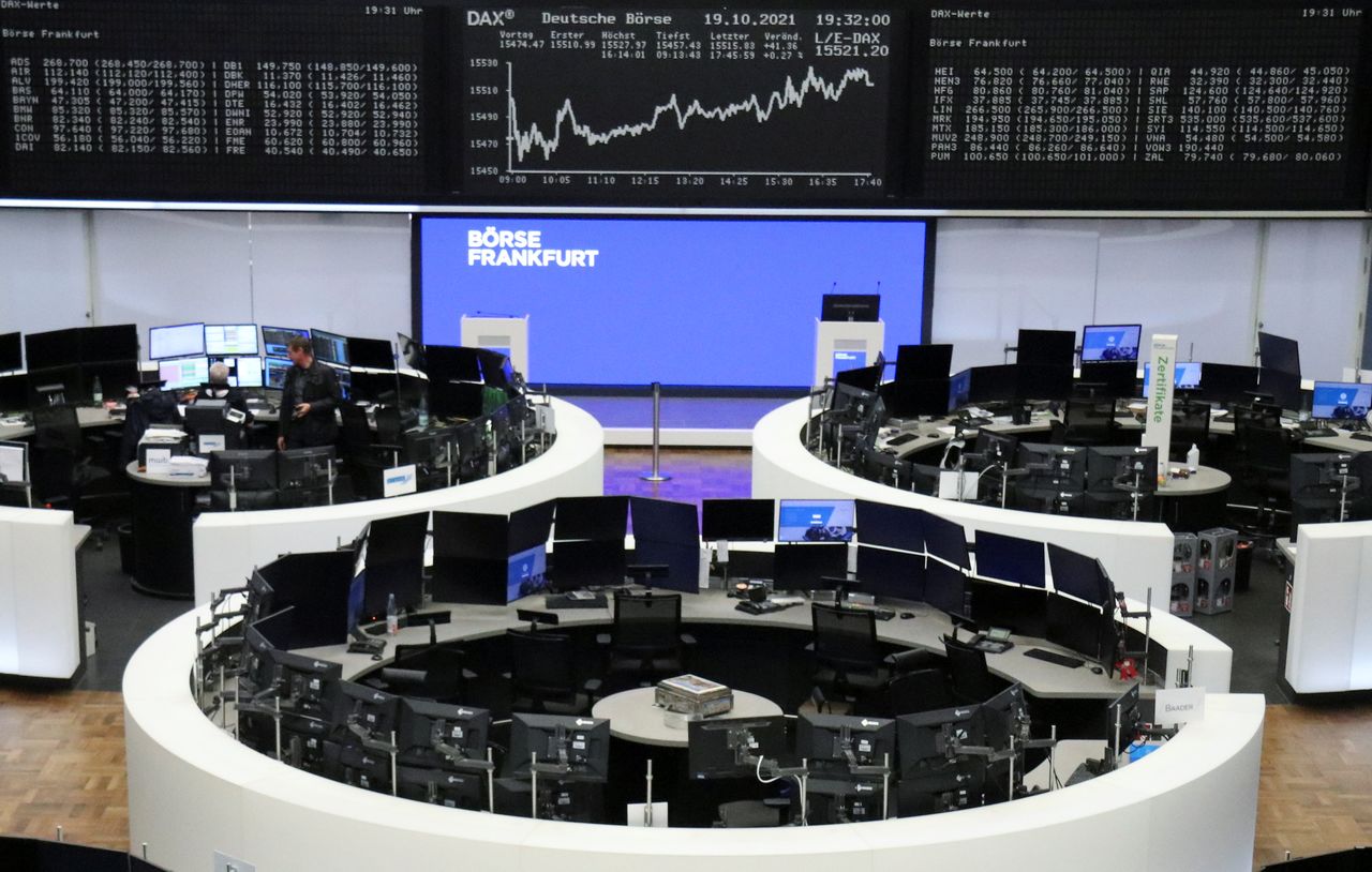 FILE PHOTO: The German share price index DAX graph is pictured at the stock exchange in Frankfurt, Germany, October 19, 2021. REUTERS/Staff