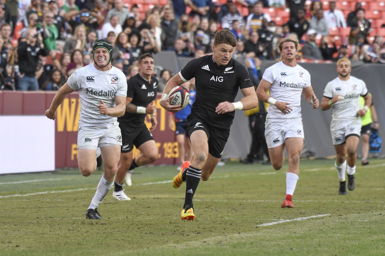 Oct 23, 2021; Washington, DC, USA; Beauden Barrett of the All Blacks advances the ball while Eagles defenders give chase during the 1874 Cup Rugby Autumn Internationals rugby match at FedEx Field featuring the New Zealand All Blacks vs the USA Eagles. Mandatory Credit: Rafael Suanes-USA TODAY Sports