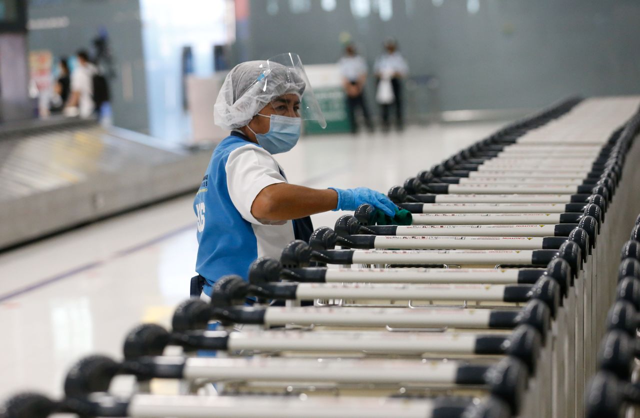 A worker is pictured during a drill in preparation for reopening for tourists with coronavirus disease (COVID-19) prevention measures at Suvarnabhumi Airport, in Bangkok, Thailand October 27, 2021. REUTERS/Soe Zeya Tun