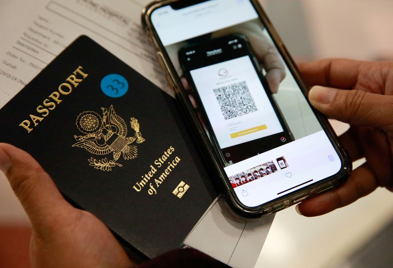 Volunteers line up during a drill as they prepare to reopen for tourists with coronavirus disease (COVID-19) prevention measures at Suvarnabhumi Airport, in Bangkok, Thailand October 27, 2021. REUTERS/Soe Zeya Tun