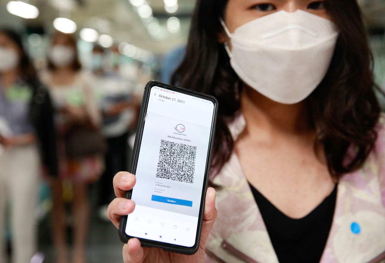 Volunteers line up during a drill as they prepare to reopen for tourists with coronavirus disease (COVID-19) prevention measures at Suvarnabhumi Airport, in Bangkok, Thailand October 27, 2021. REUTERS/Soe Zeya Tun