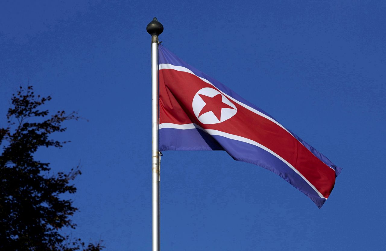FILE PHOTO: A North Korean flag flies on a mast at the Permanent Mission of North Korea in Geneva October 2, 2014. REUTERS/Denis Balibouse