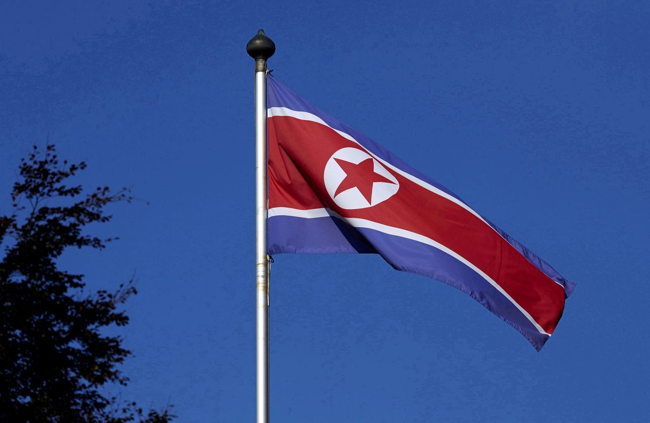 FILE PHOTO: A North Korean flag flies on a mast at the Permanent Mission of North Korea in Geneva October 2, 2014. REUTERS/Denis Balibouse