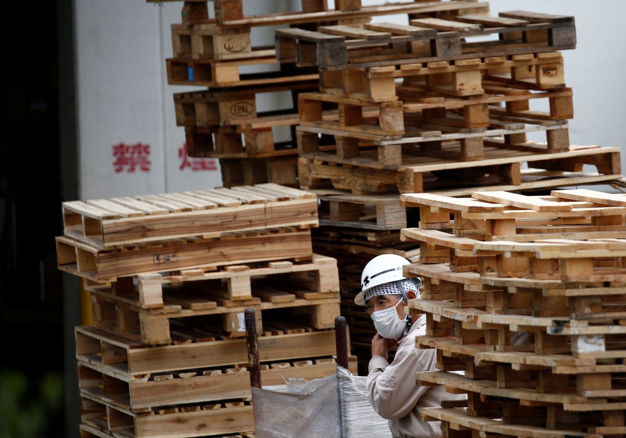 A worker takes a rest at a warehouse at the Keihin Industrial Zone in Kawasaki, Japan September 12, 2018. REUTERS/Kim Kyung-Hoon