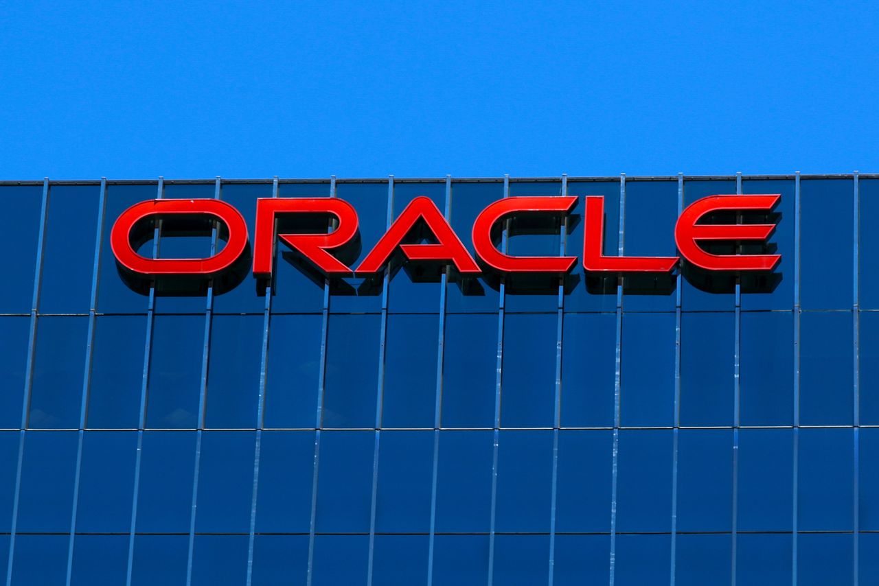 FILE PHOTO: The Oracle logo is shown on an office building in Irvine, California, U.S. June 28, 2018. REUTERS/Mike Blake