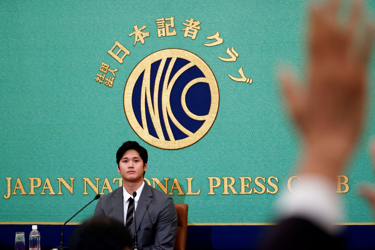Japanese two-way baseball player for the Los Angeles Angels Shohei Ohtani attends a news conference at the Japan National Press Club in Tokyo, Japan November 15, 2021.  REUTERS/Issei Kato