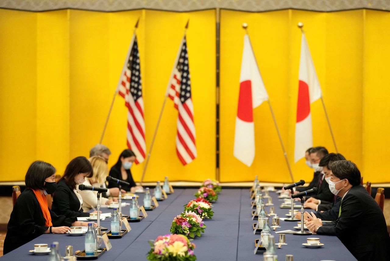 U.S. Trade Representative Katherine Tai speaks to Japanese Foreign Affairs Minister Yoshimasa Hayashi at the start of their meeting at the Iikura Guest House in Tokyo, Japan, November 17 2021. Franck Robichon/Pool via REUTERS