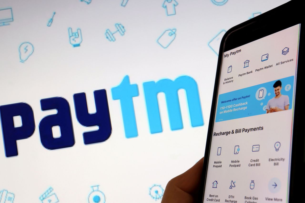 FILE PHOTO: The interface of Indian payments app Paytm is seen in front of its logo displayed in this illustration picture taken July 7, 2021. REUTERS/Florence Lo/Illustration