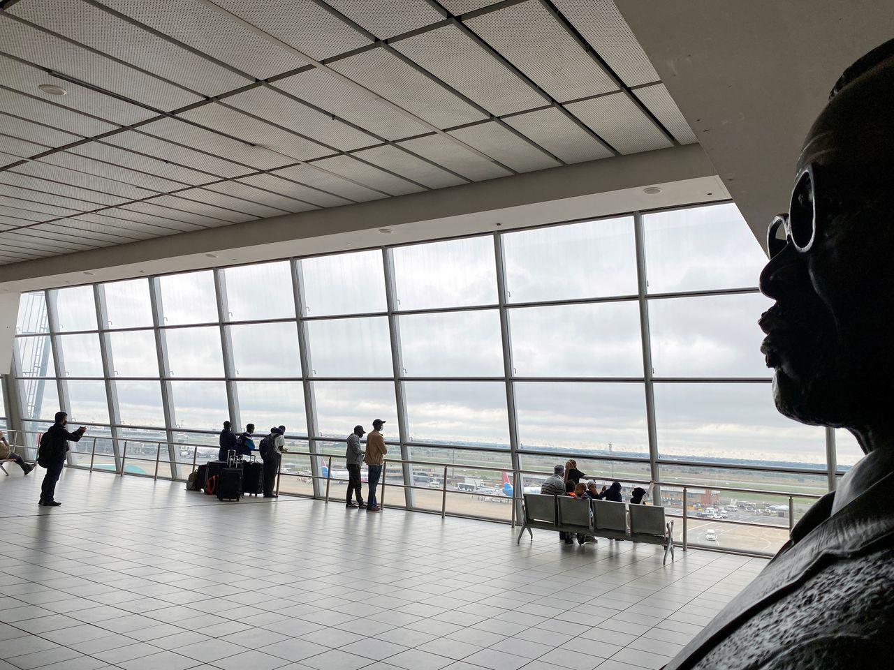 Passengers wait to board flights, amidst the spread of the new SARS-CoV-2 variant, at O.R. Tambo International Airport in Johannesburg, South Africa, November 27, 2021. REUTERS/ Sumaya Hisham