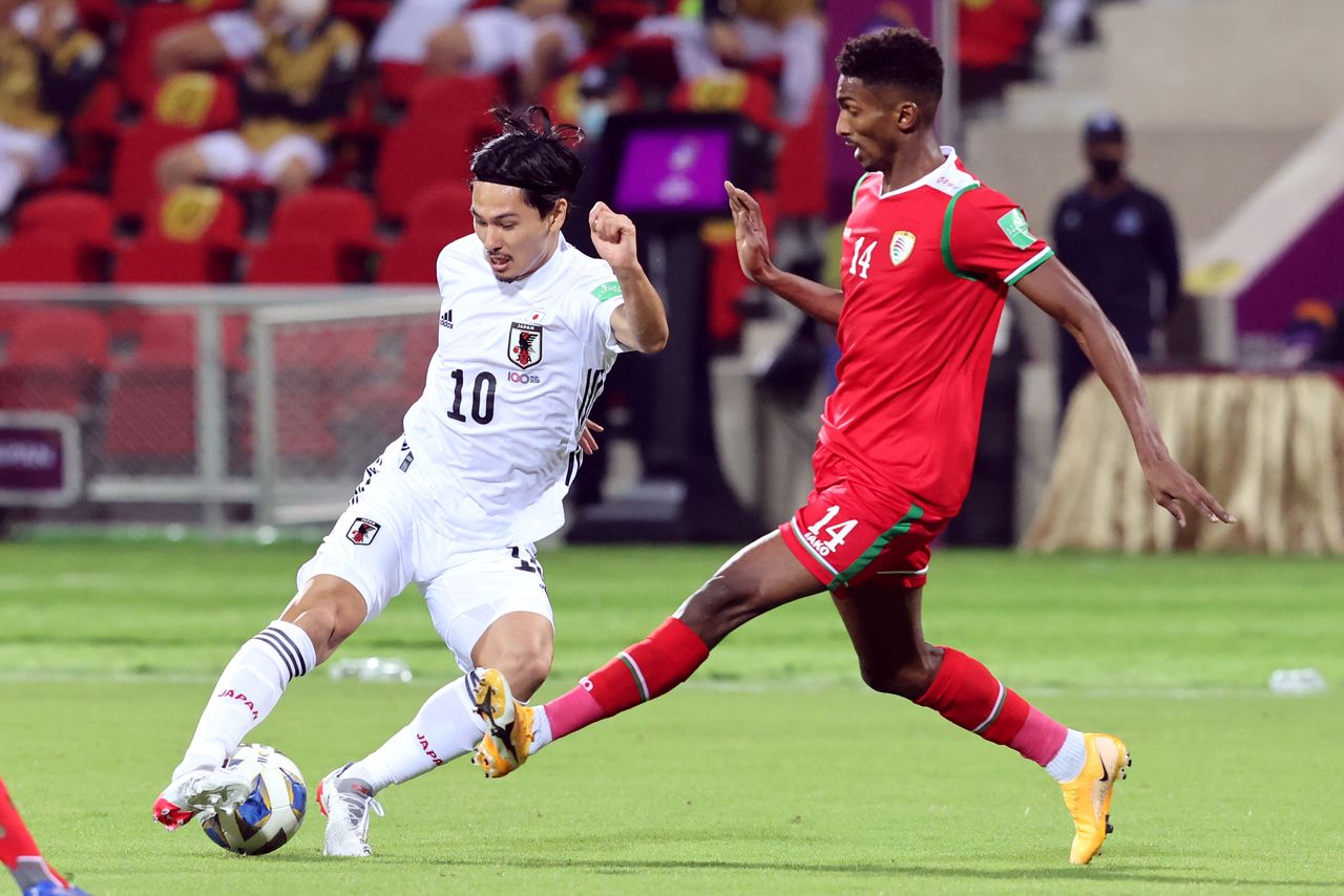 FILE PHOTO: Soccer Football - World Cup - Asian Qualifiers - Third Round - Group B - Oman v Japan - Sultan Qaboos Sports Stadium, Muscat, Oman - November 16, 2021 Japan