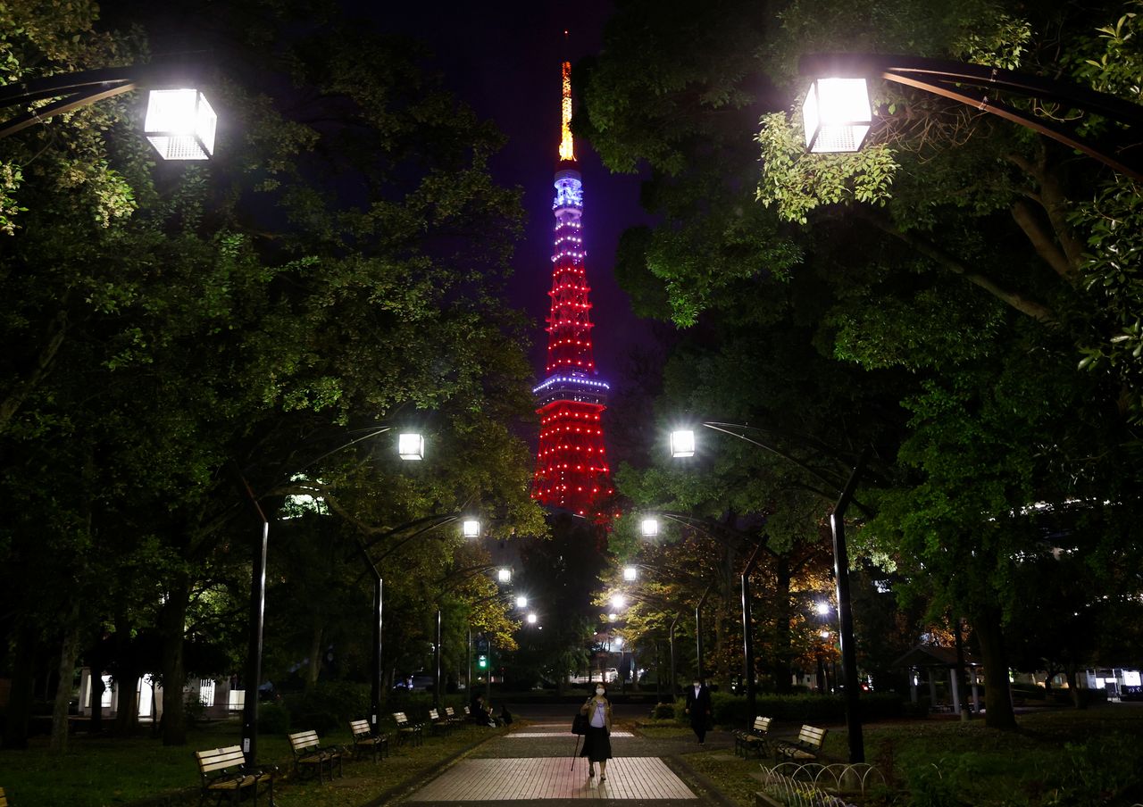FILE PHOTO: Tokyo Tower is illuminated in the colours of the Los Angeles Angels, after their player Shohei Ohtani won the Most Valuable Player (MVP) award for Major League Baseball